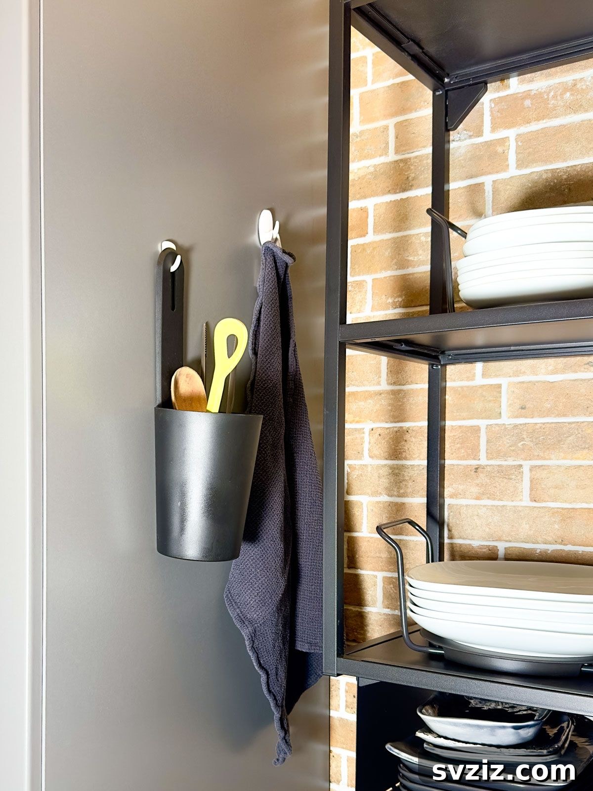 Command Hooks on the Fridge to Hang Towels and Utensils in a Small Kitchen