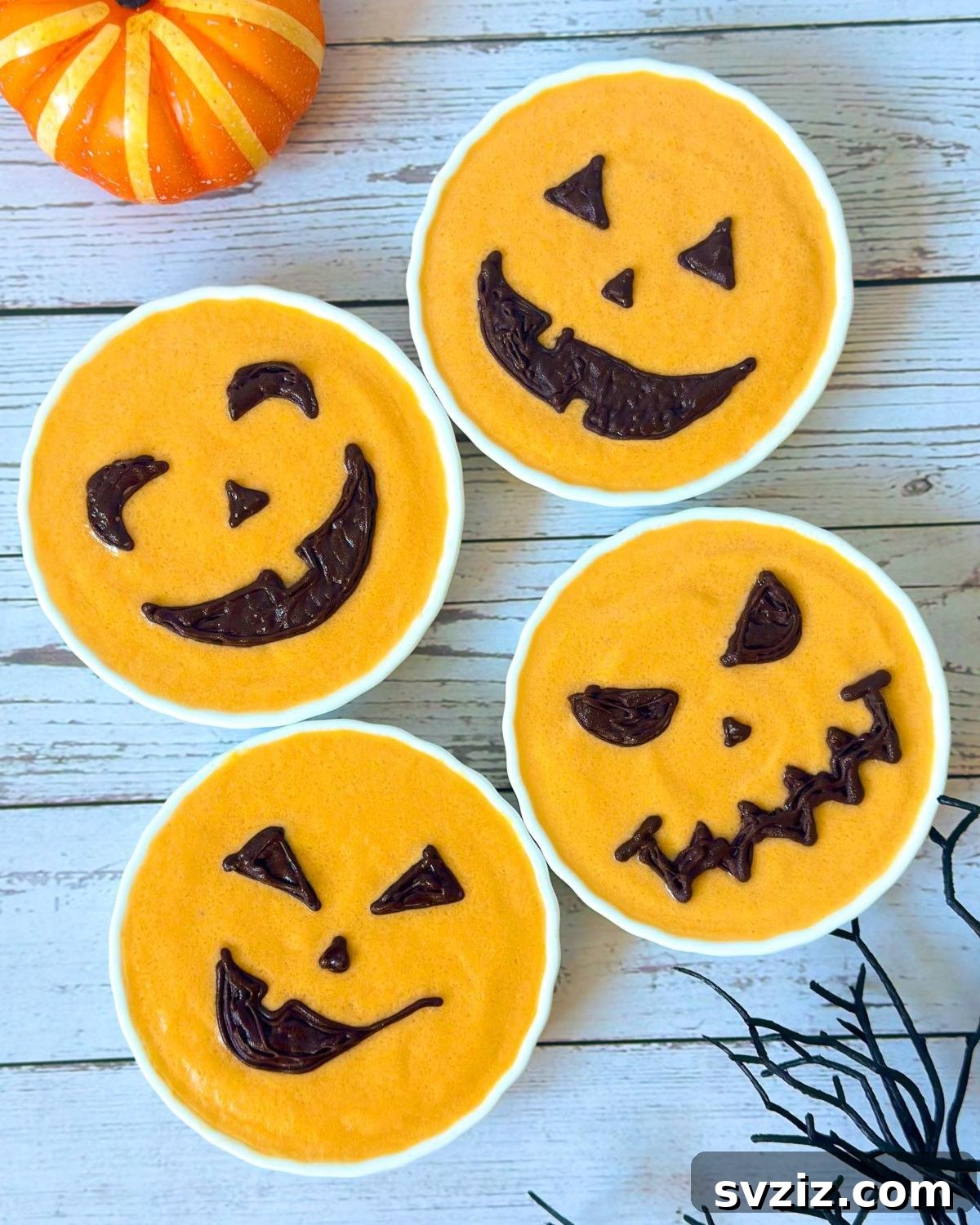 31 Terrifying Halloween Bash Concepts 12 Jack O Lantern smoothies made with oranges and chocolate chips