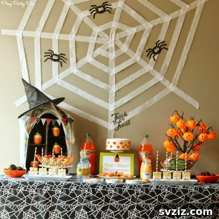 31 Terrifying Halloween Bash Concepts 31 DIY Halloween backdrop with spider webs and plastic spiders
