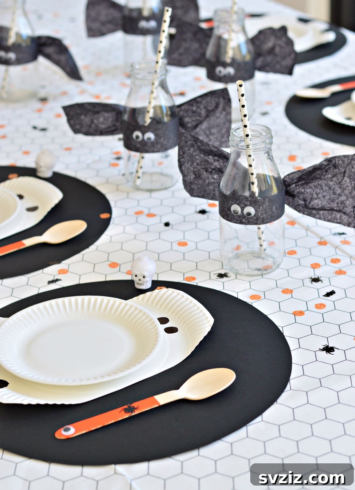 31 Terrifying Halloween Bash Concepts 7 Spooky DIY Halloween table decor with monster spoons and bat bottles
