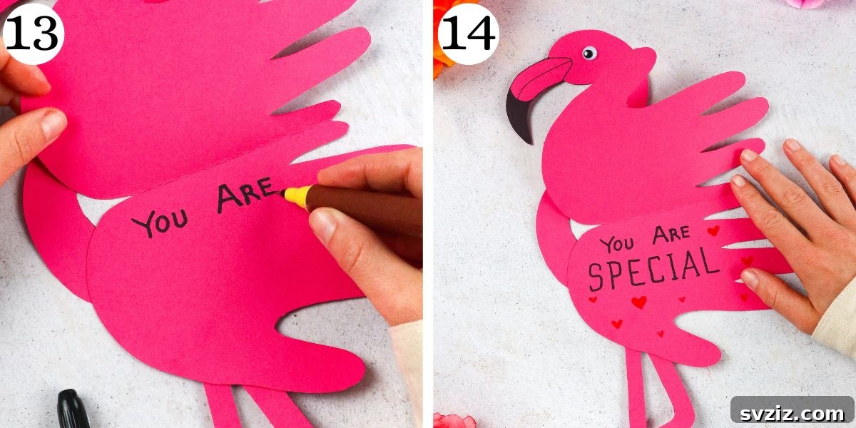 Flamingo Handprint Delight 10 An image showing the finished handprint flamingo card opened up, with blank space inside for a personalized message, highlighting its keepsake value.