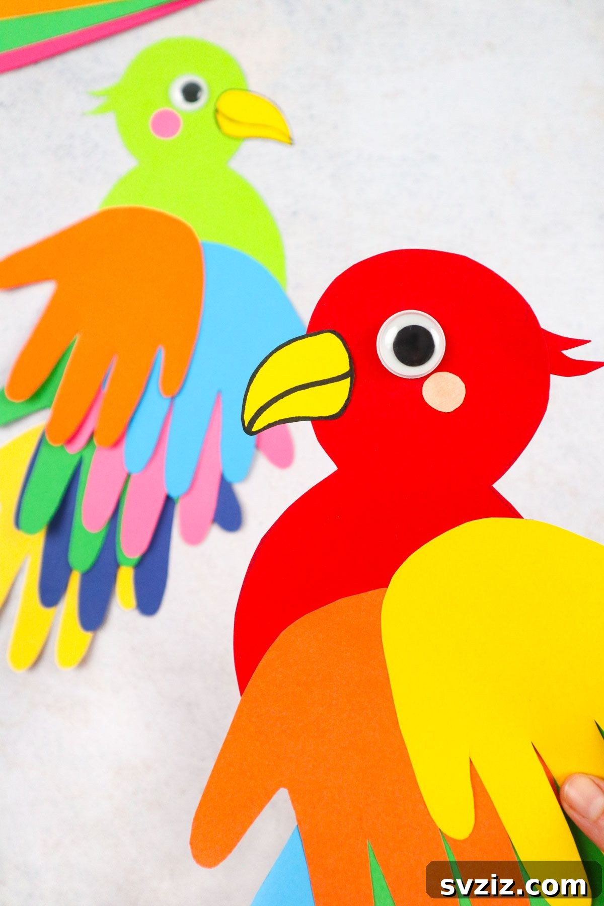 Vibrant Handprint Parrot Craft for Kids