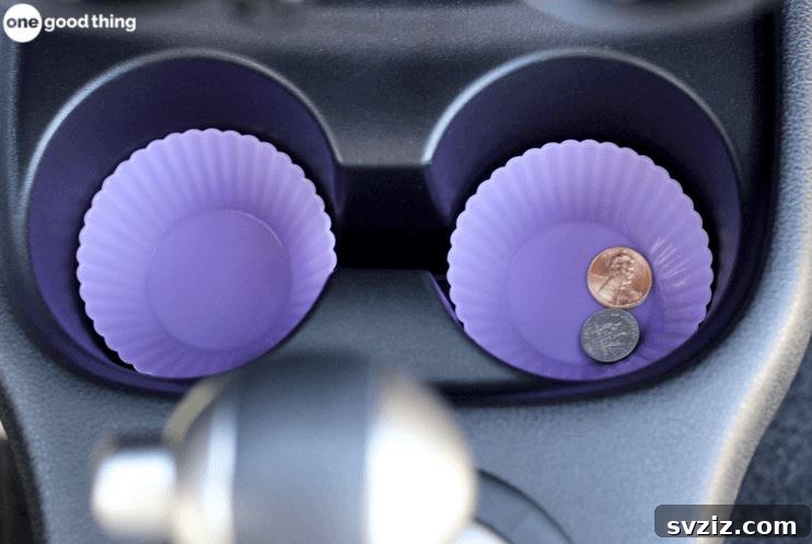 20 Effortless Car Organization Tips 14 Silicone muffin cups used as liners in car cup holders for easy cleaning.