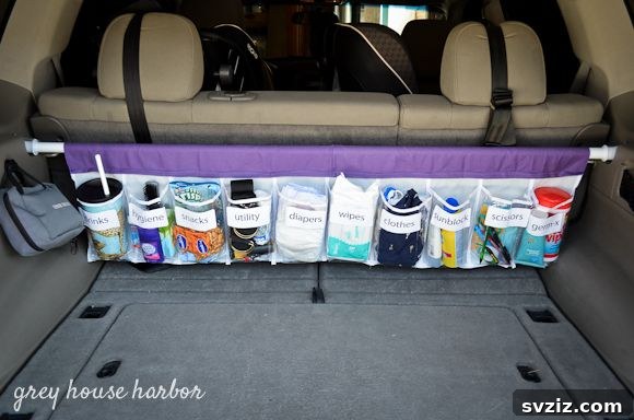 20 Effortless Car Organization Tips 3 DIY car organizer made from a shoe organizer, perfect for baby essentials or emergency supplies.