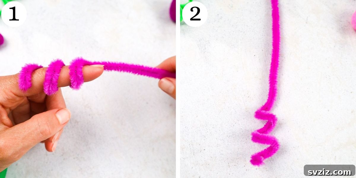 A hand wrapping a colorful pipe cleaner around a finger to form the base of a puppet.