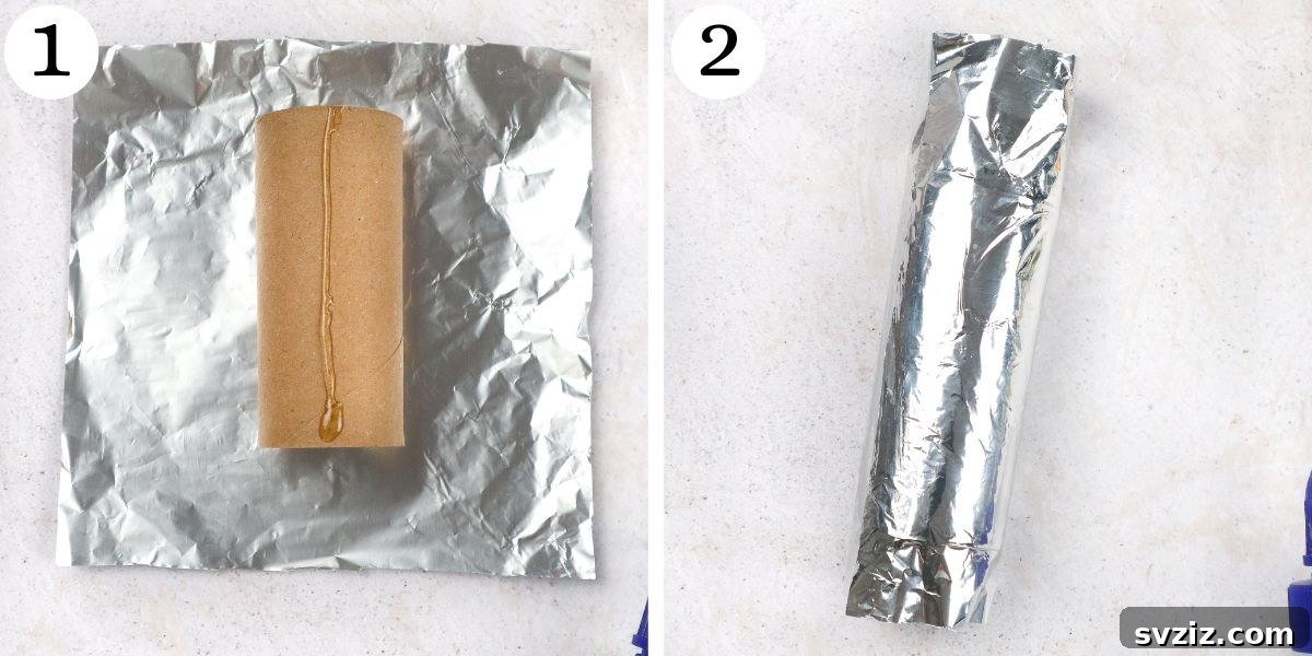 Wrapping foil around a toilet paper roll for robot body
