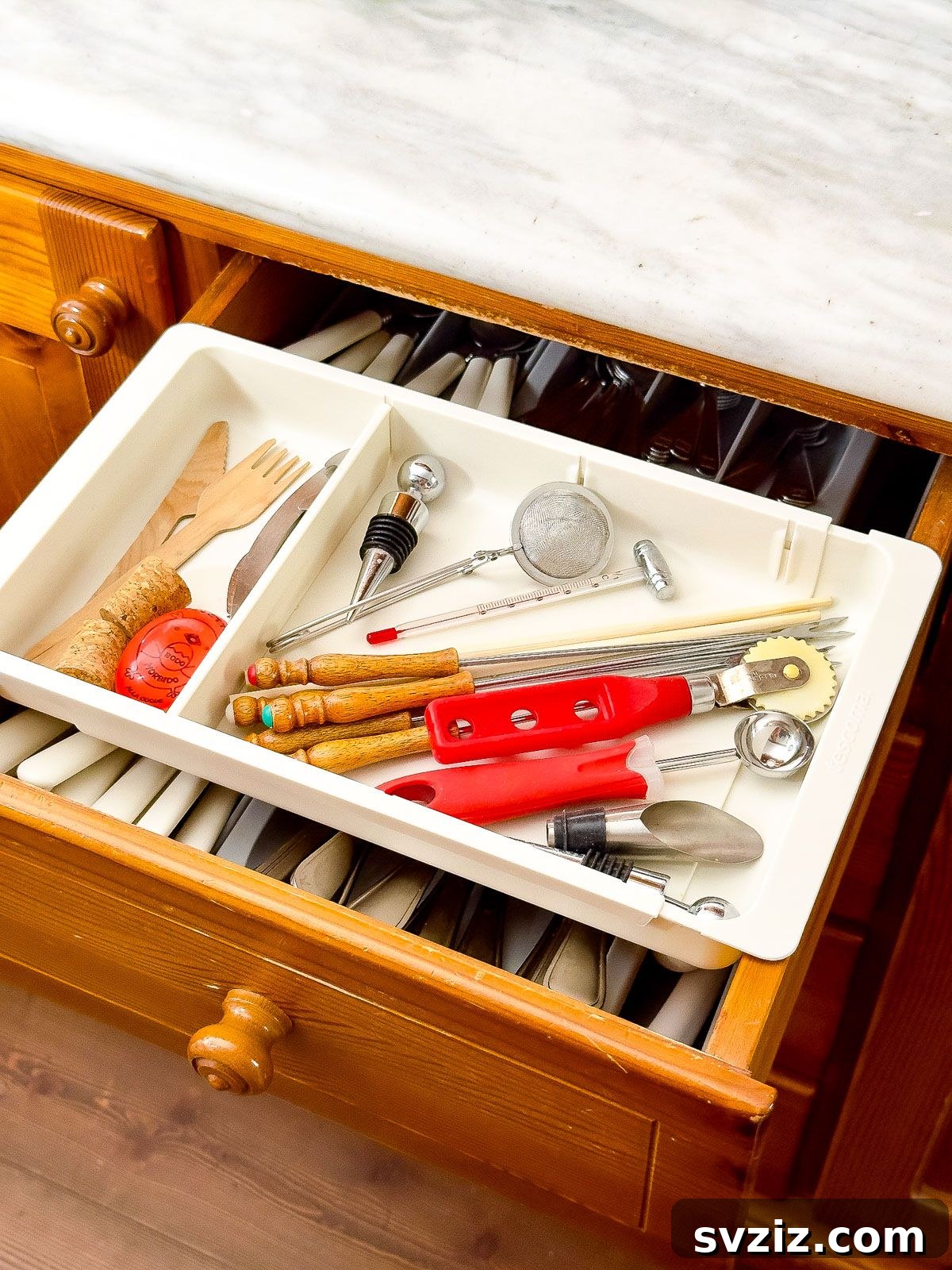 Expandable Tray on Drawer Sides for More Storage