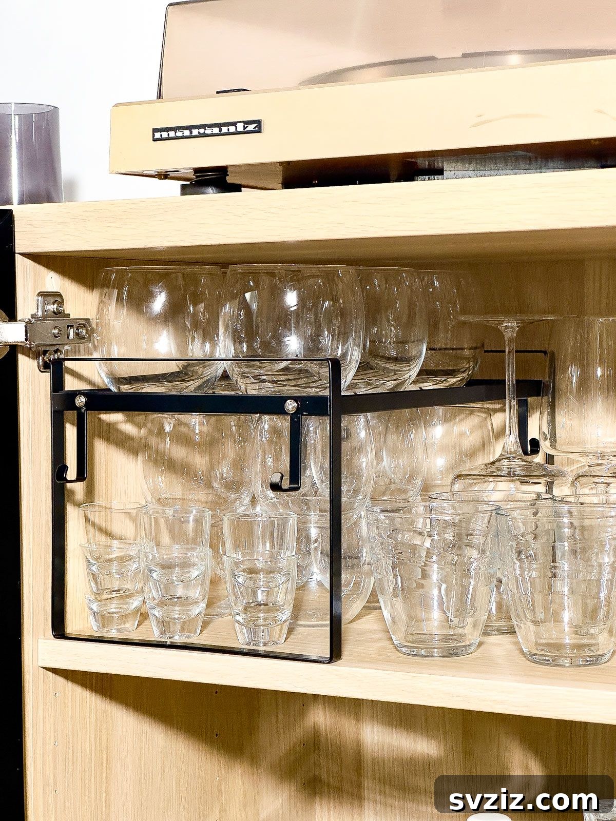 Utilize Shelf Risers for Efficient Kitchen Cabinet Storage