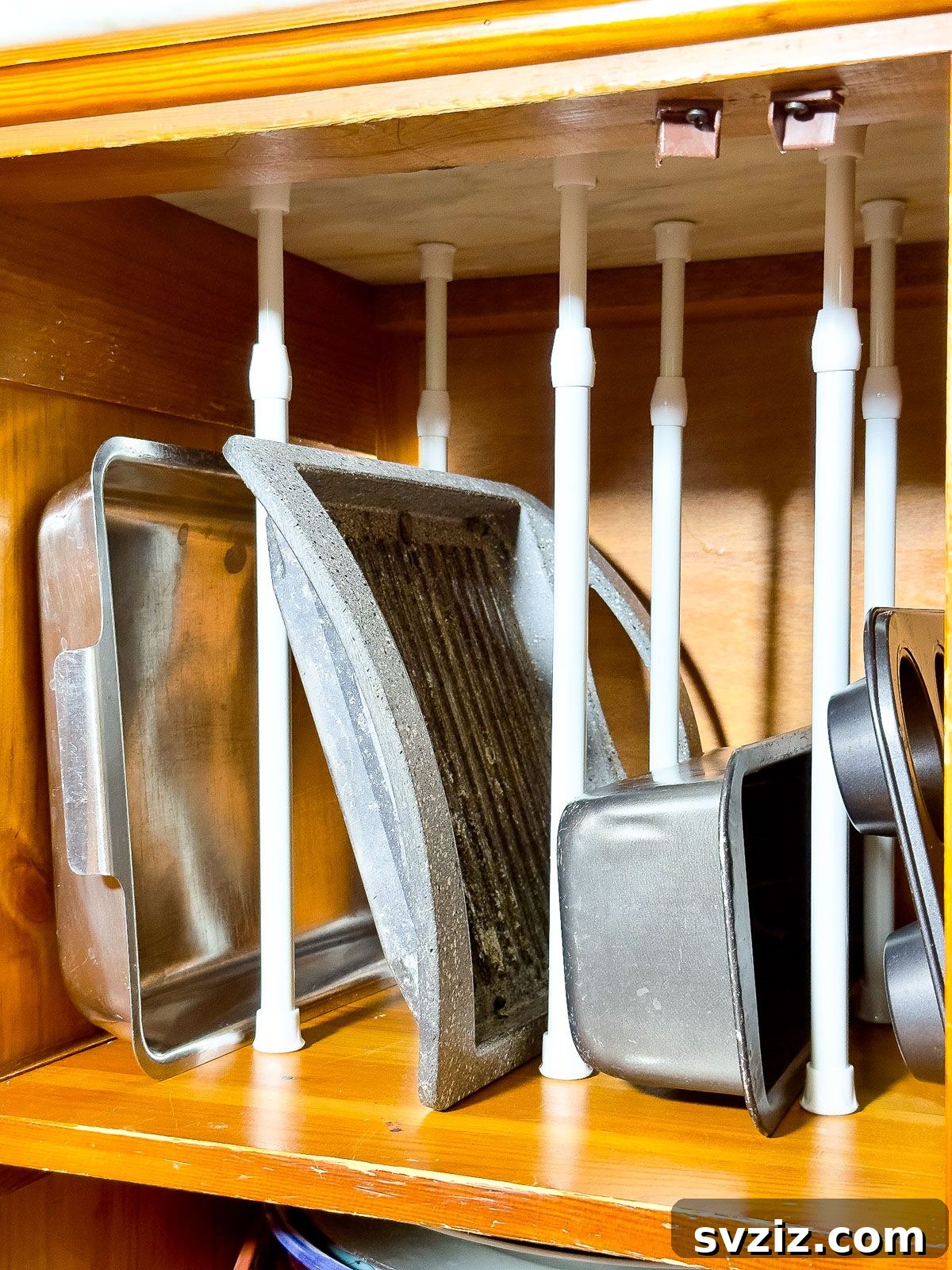 Vertical Storage for Baking Trays Using Tension Rods