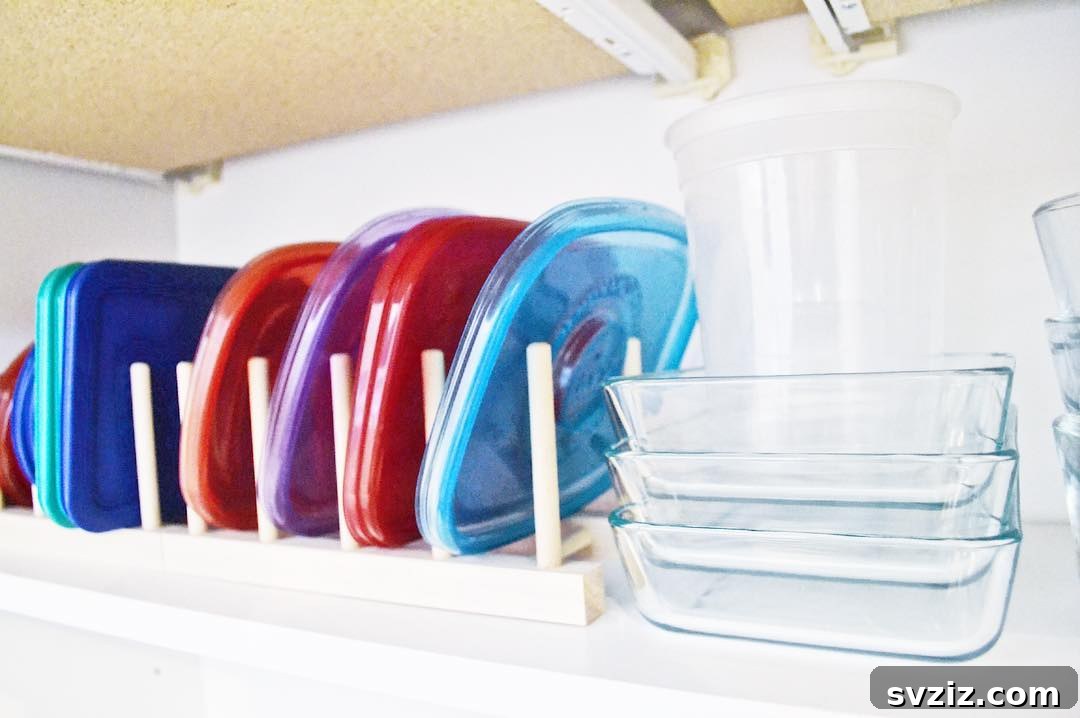 Never Lose a Lid Again: Ultimate Tupperware Organization 23 Cutting Board Organizer