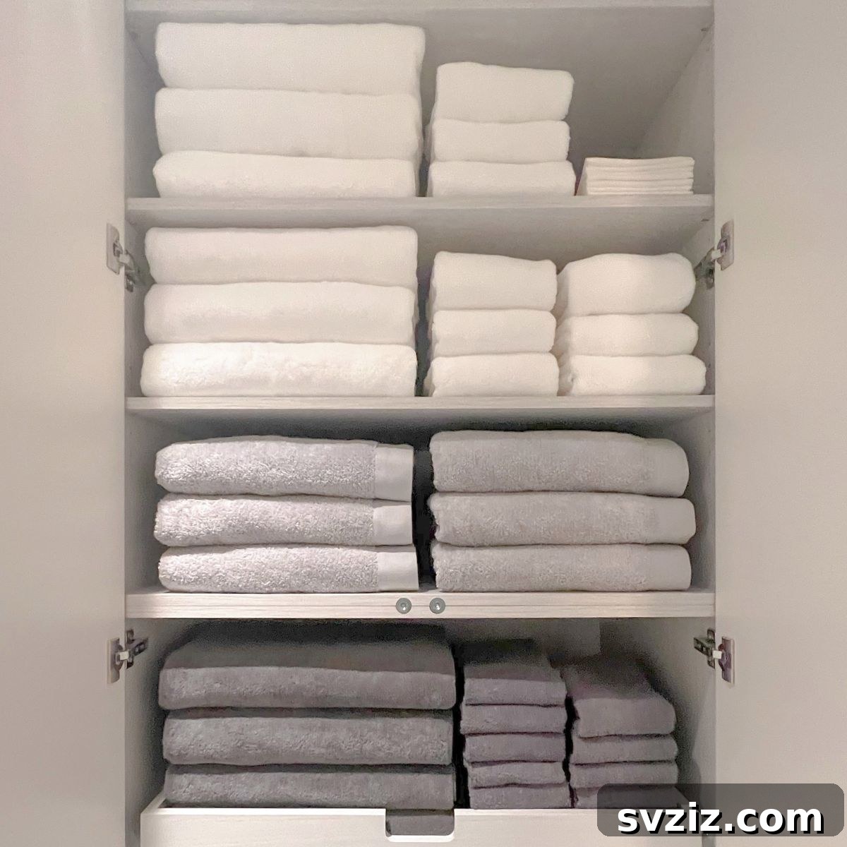 23 Brilliant Towel Storage Ideas to Transform Your Bathroom 20 Color-Coded Towel Organization