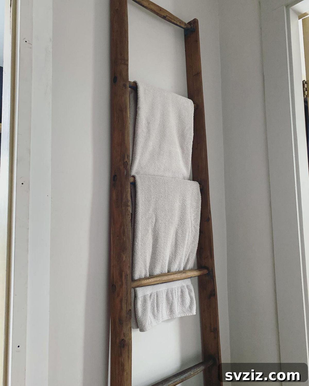 23 Brilliant Towel Storage Ideas to Transform Your Bathroom 4 Rustic Vintage Ladder for Towels