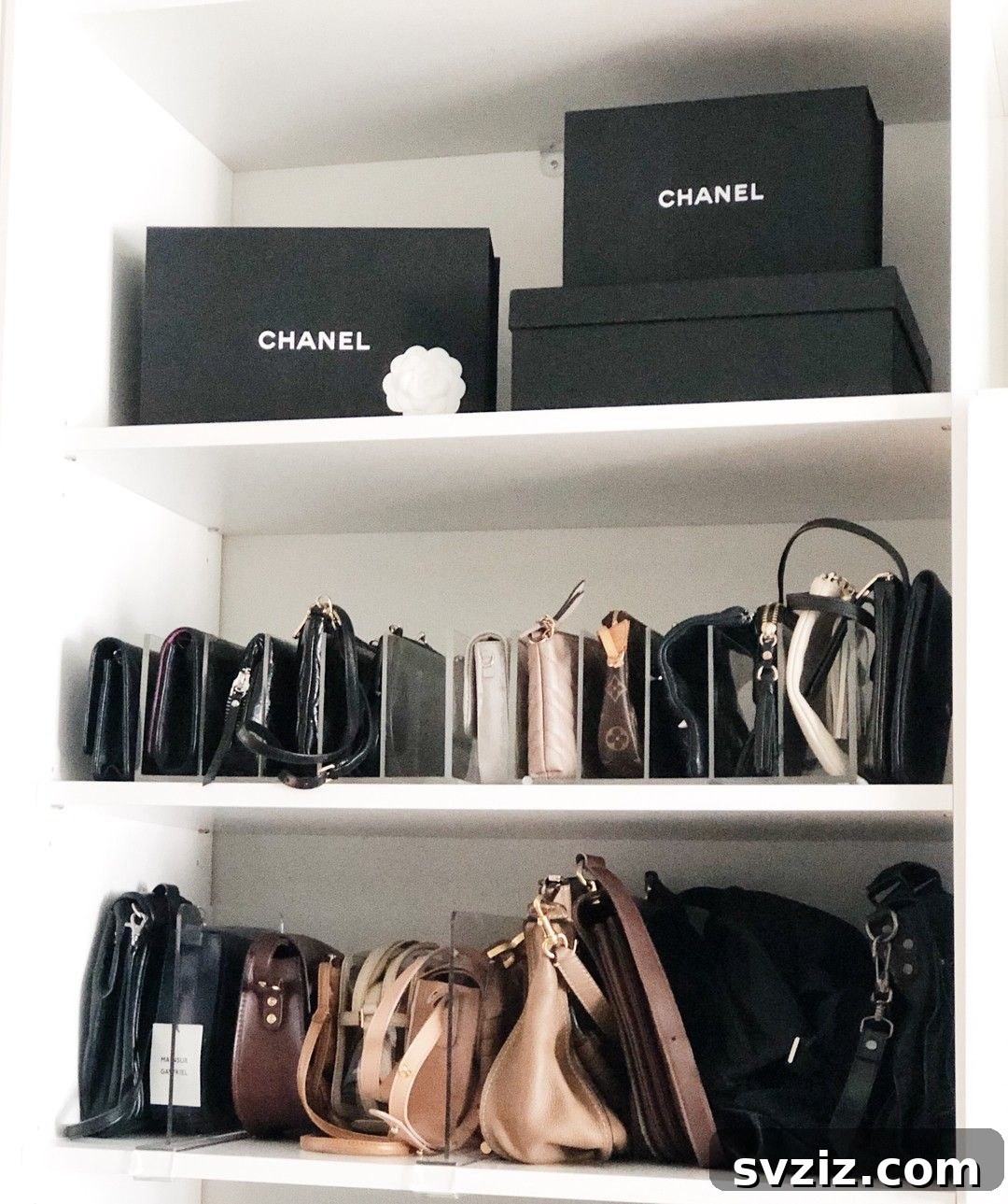 Acrylic shelf dividers organizing purses on a closet shelf