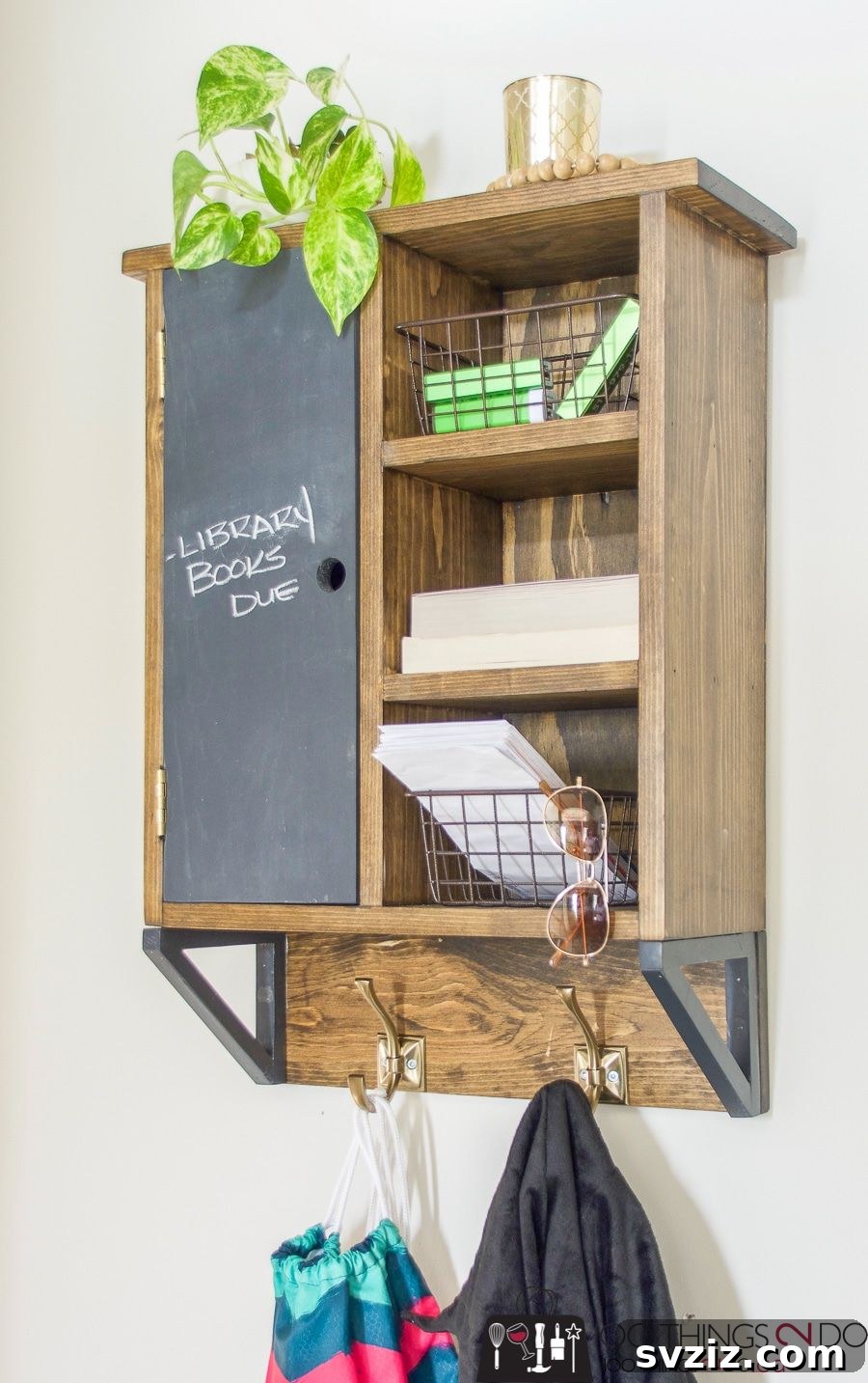 17 Clever DIY Wall Organizers to Conquer Clutter 15 Multifunctional DIY wall organizer for entryway with coat hangers, blackboard, and shelf