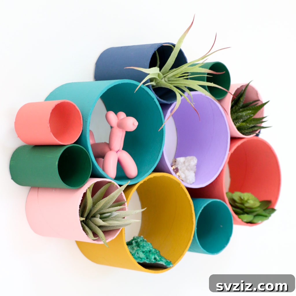 17 Clever DIY Wall Organizers to Conquer Clutter 3 DIY wall organizer made from recycled cardboard tubes, ideal for craft supplies