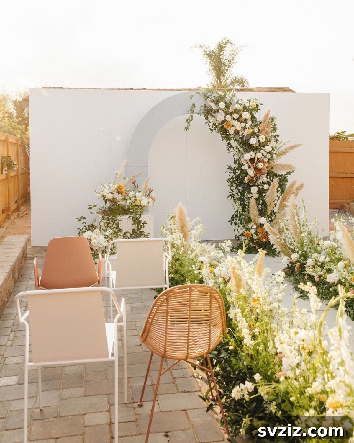 Small Weddings, Big Charm: 31 Intimate Ideas 15 Intimate Backyard Wedding with elegant flower-lined aisle and arch