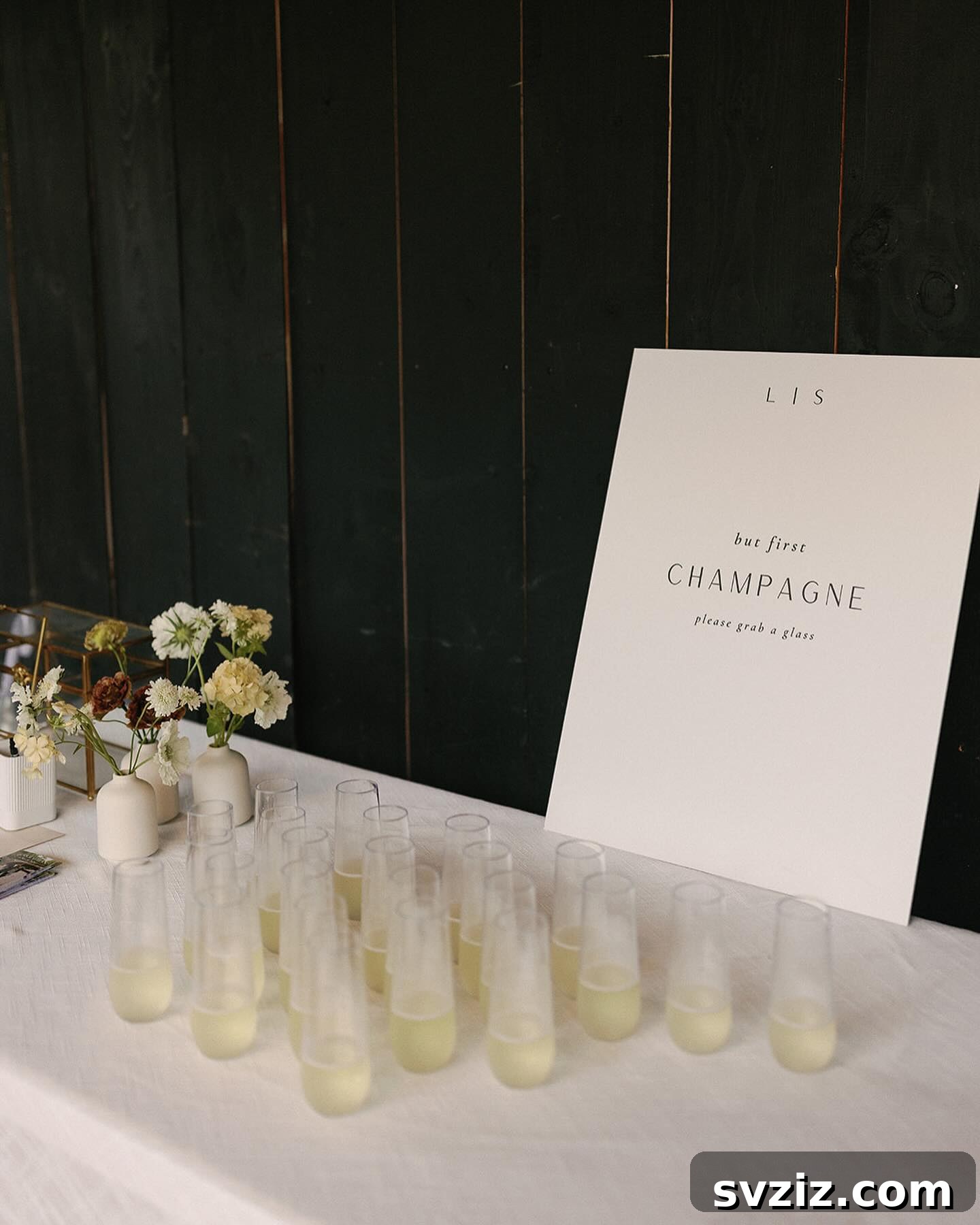 Small Weddings, Big Charm: 31 Intimate Ideas 19 Wedding Champagne Welcome Table offering celebratory drinks to guests