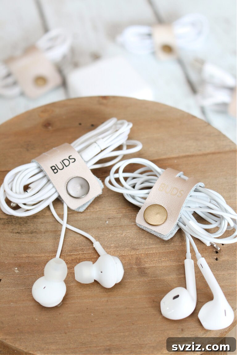 27 Smart Solutions for Organizing Clutter 13 Cord Organizers - DIY cord organizers made from leather, neatly wrapping charging cables and wires, showcasing an effective solution for tangled cords.