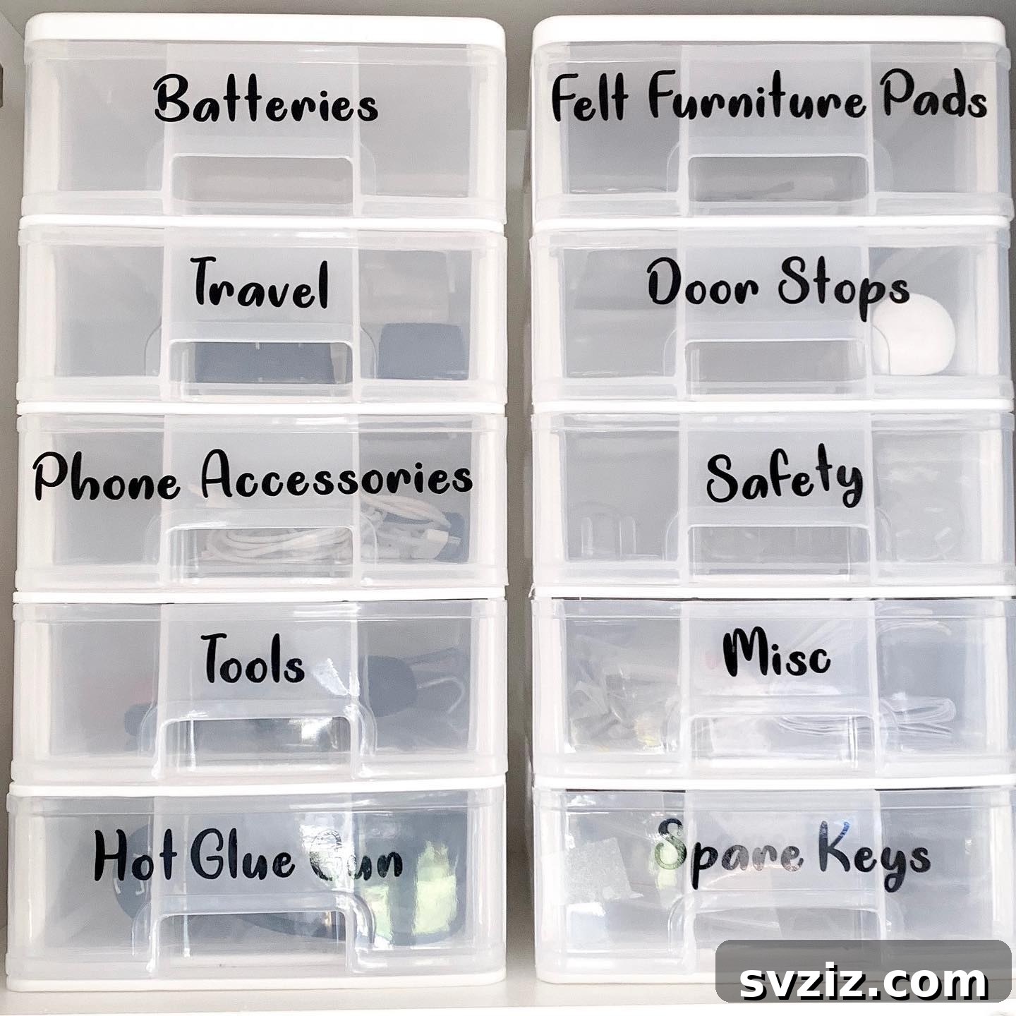 27 Smart Solutions for Organizing Clutter 14 Labeled Drawers - A set of small, stacked drawers, each clearly labeled with its contents like 'Batteries,' 'Cables,' and 'Keys,' for systematic organization.