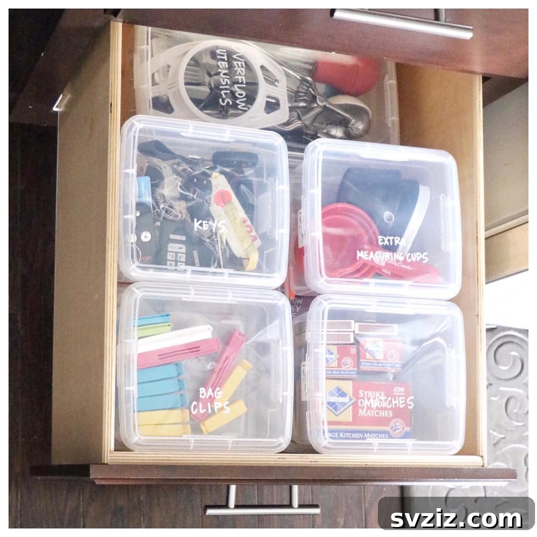 27 Smart Solutions for Organizing Clutter 20 Clear Containers with Labelled Lids - Stacked clear containers, each with a white labeled lid, organizing small craft supplies or office items, showing organized and visible storage.