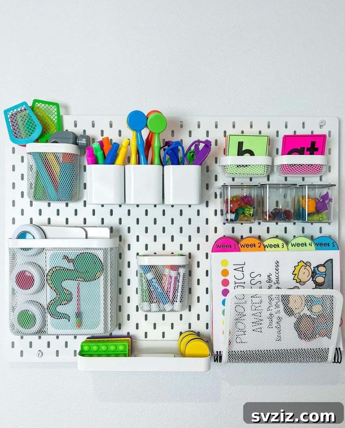 17 Genius School Office Organization Hacks 3 Pegboard organization for teachers, featuring various school supplies neatly arranged in baskets and hooks.
