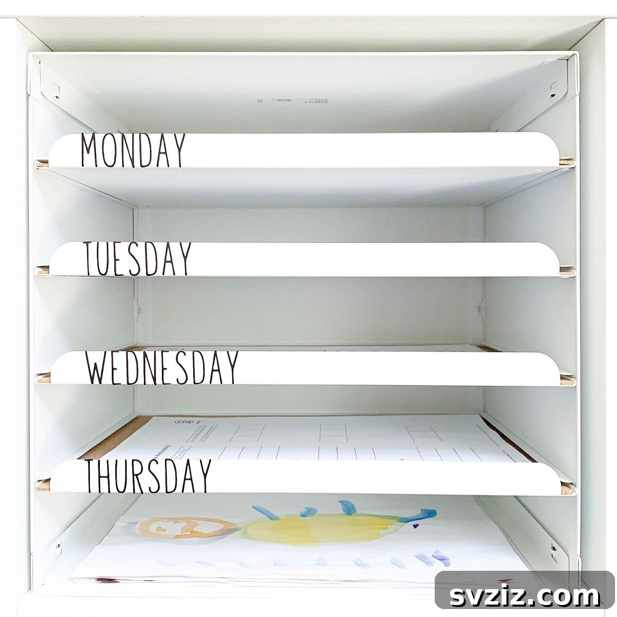 17 Genius School Office Organization Hacks 6 IKEA system used with weekly dividers to organize school supplies by day of the week.