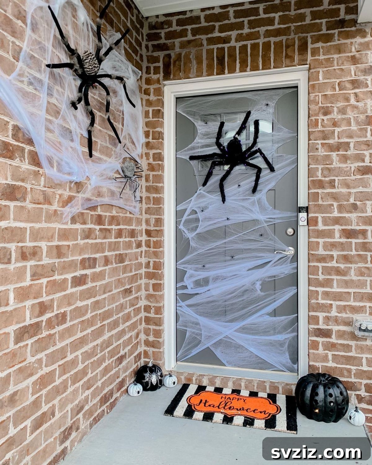 Spooky spider web front door decoration for Halloween