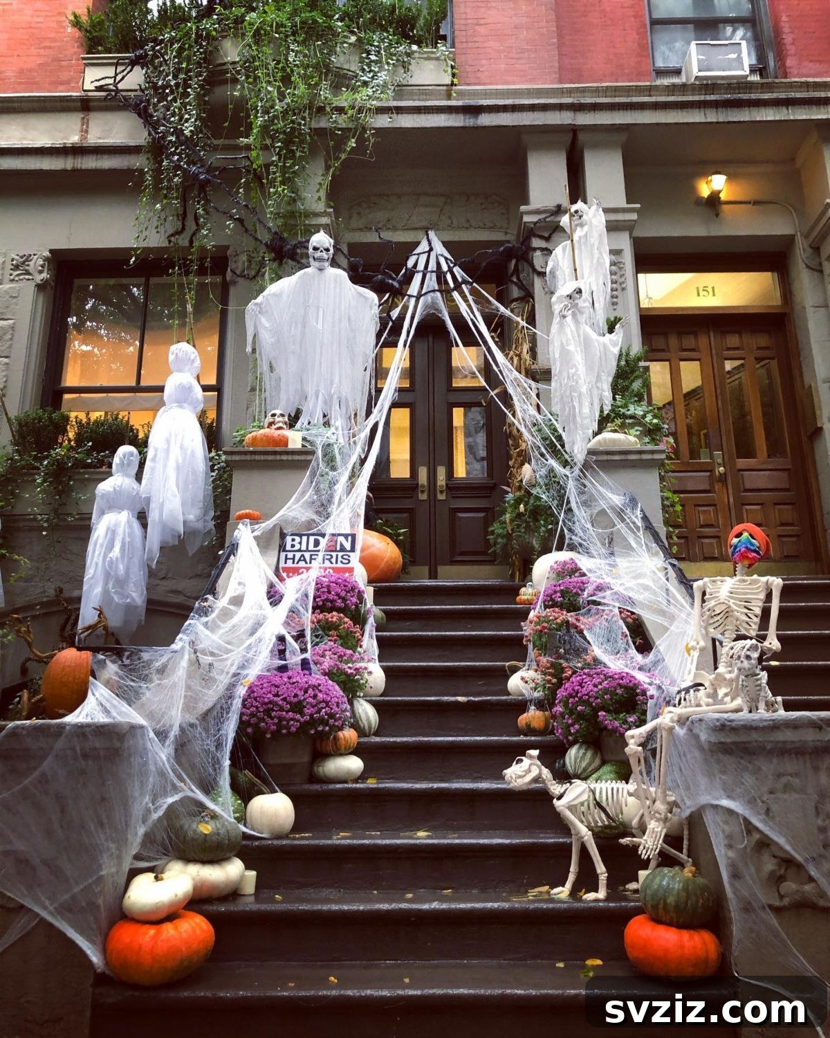 Terrifying Halloween stairway entrance with ghosts and skeletons
