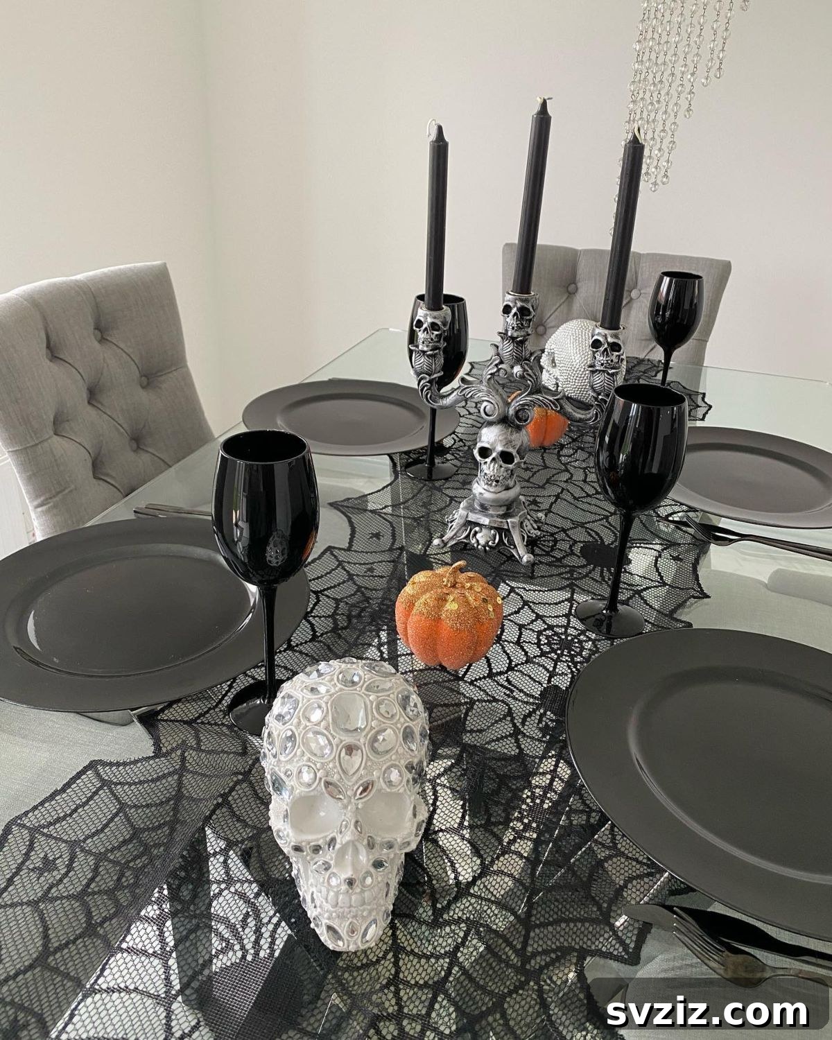 Transform Your Table: Haunting Halloween Decor Inspirations 7 spider webs and skulls
