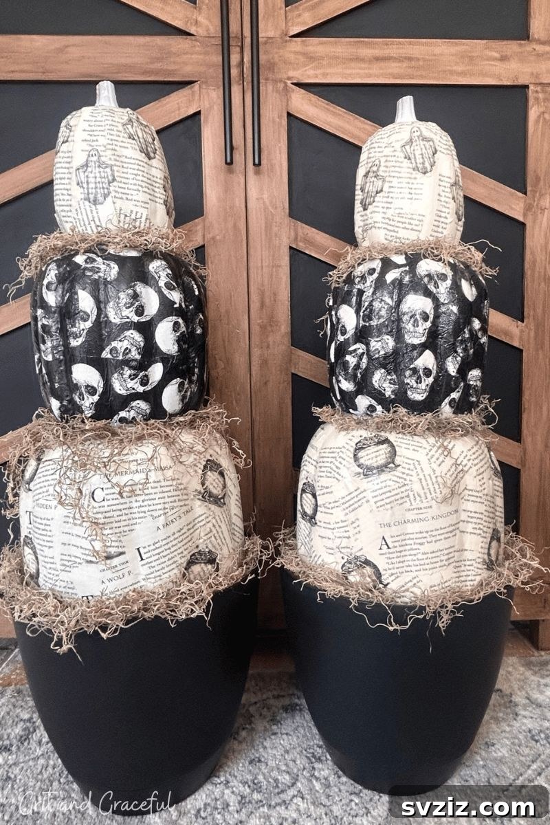 Spine-Chilling Interiors: 31 Scary Halloween Decor Ideas 13 Stacked Pumpkin Topiary