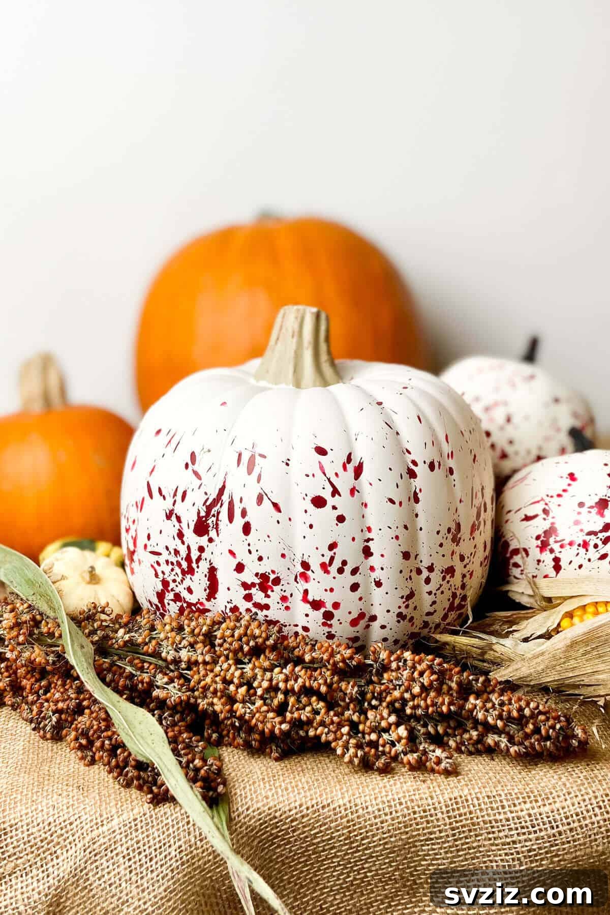 Spine-Chilling Interiors: 31 Scary Halloween Decor Ideas 15 Halloween Splatter Pumpkins