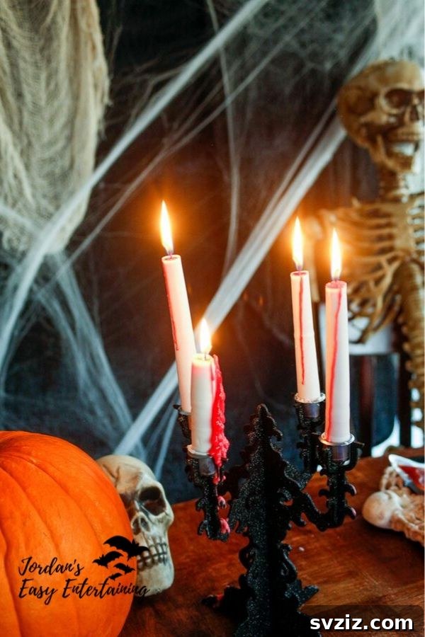 Spine-Chilling Interiors: 31 Scary Halloween Decor Ideas 3 bleeding candle