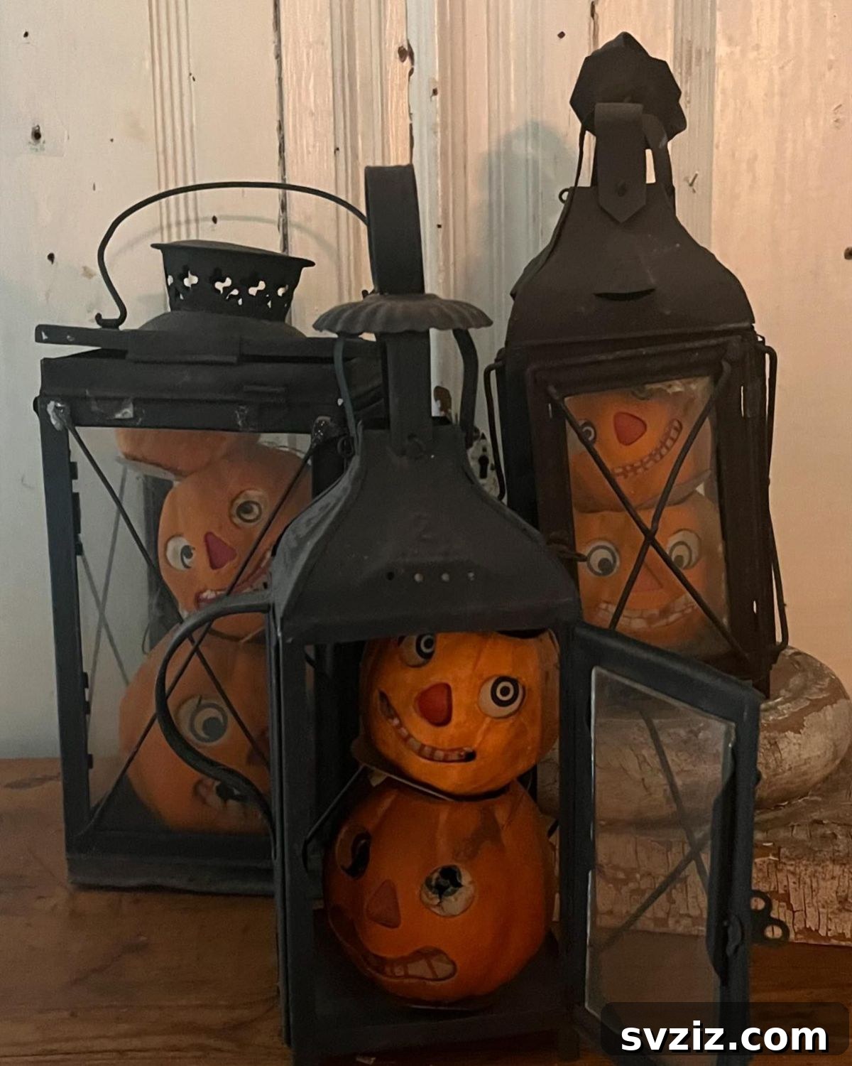Spine-Chilling Interiors: 31 Scary Halloween Decor Ideas 27 Metal Pumpkin Lanterns