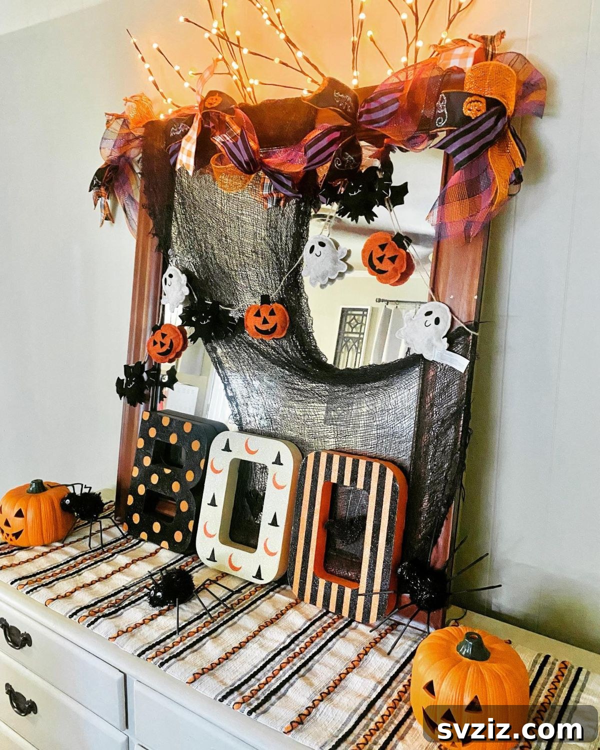 Spine-Chilling Interiors: 31 Scary Halloween Decor Ideas 29 Halloween Dresser