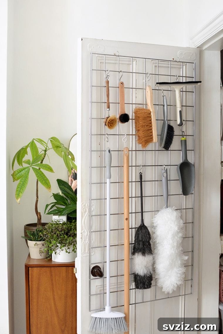 Housekeeping closet organization with grid panels and S-hooks