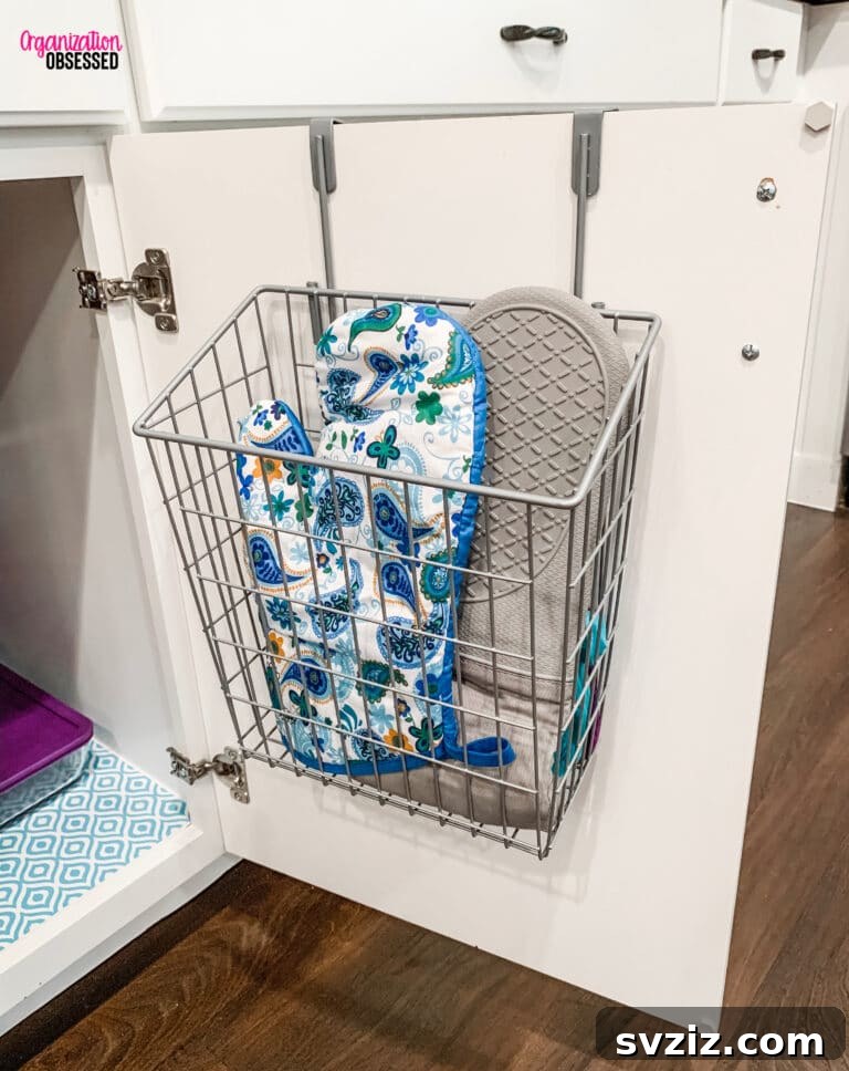 Under-sink door storage for oven mitts and pot holders