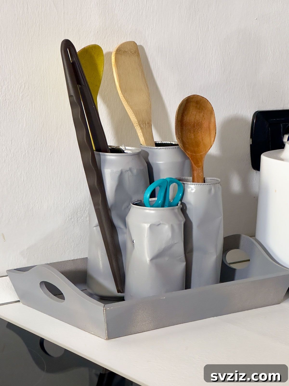 Use Empty Cans to Create a Utensil Holder