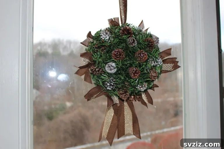 Delightful Pinecone Holiday Projects 9 DIY pinecone Christmas kissing ball decor