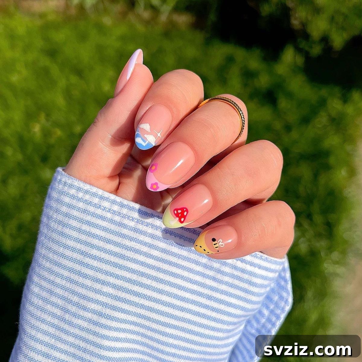 Mix and match French tip nails with various cute designs on short nails