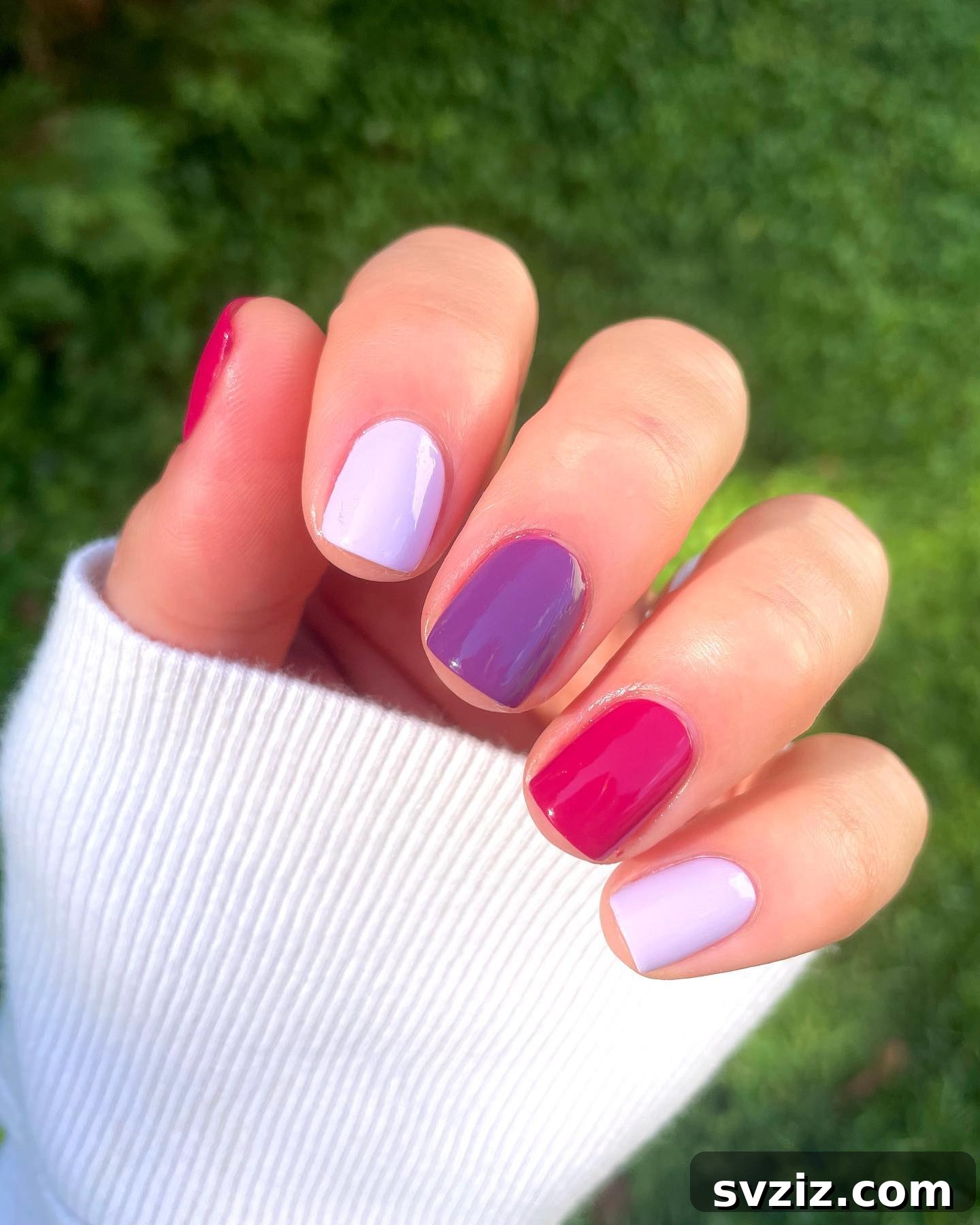 Multi-colored Skittle manicure on short nails