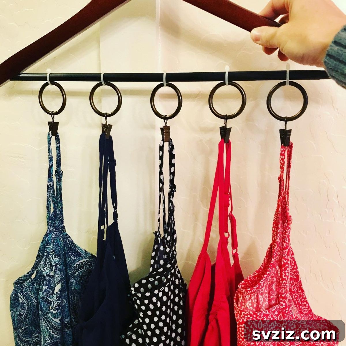 Smart Solutions for Shirt Storage 13 Rings on a Rail for Tank Top Organization