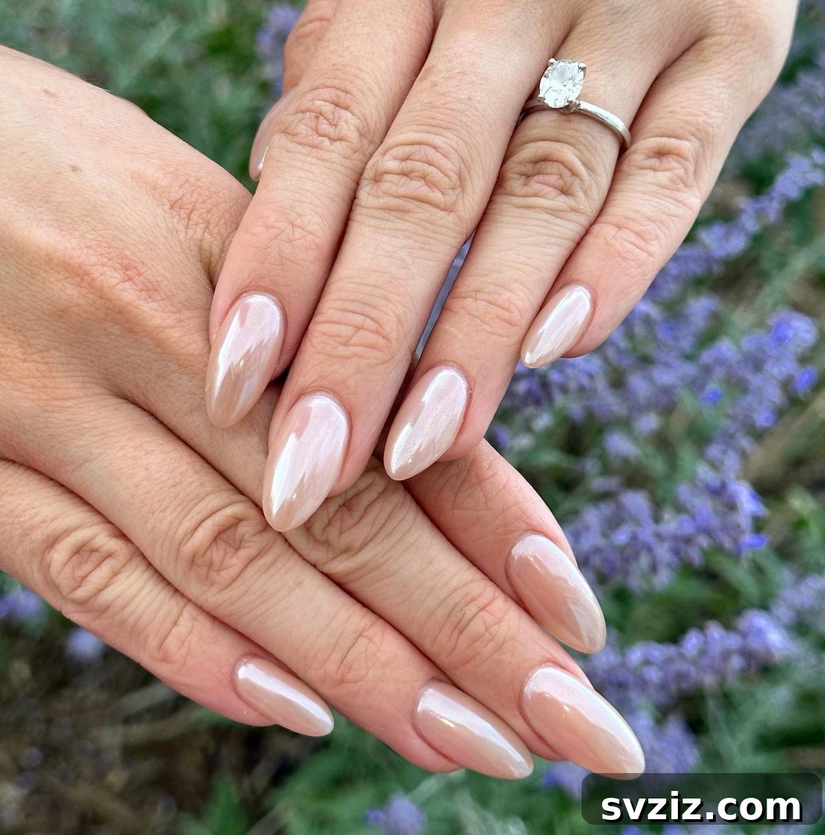 Stunning Bridal Nail Art Inspiration 11 Modern nude white chrome nails for a minimalist bridal look