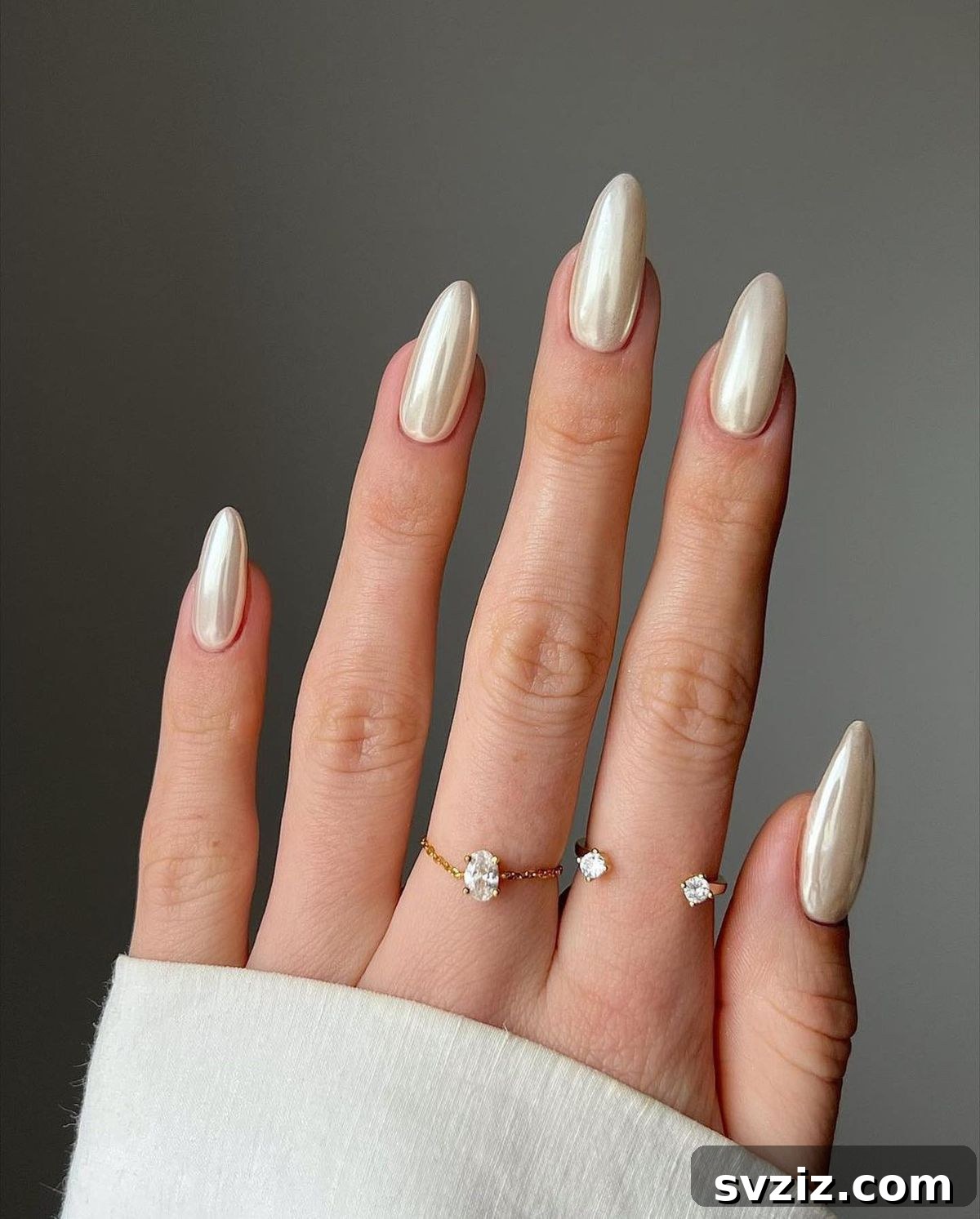 Stunning Bridal Nail Art Inspiration 18 Subtle and chic vanilla chrome nails for a modern bride