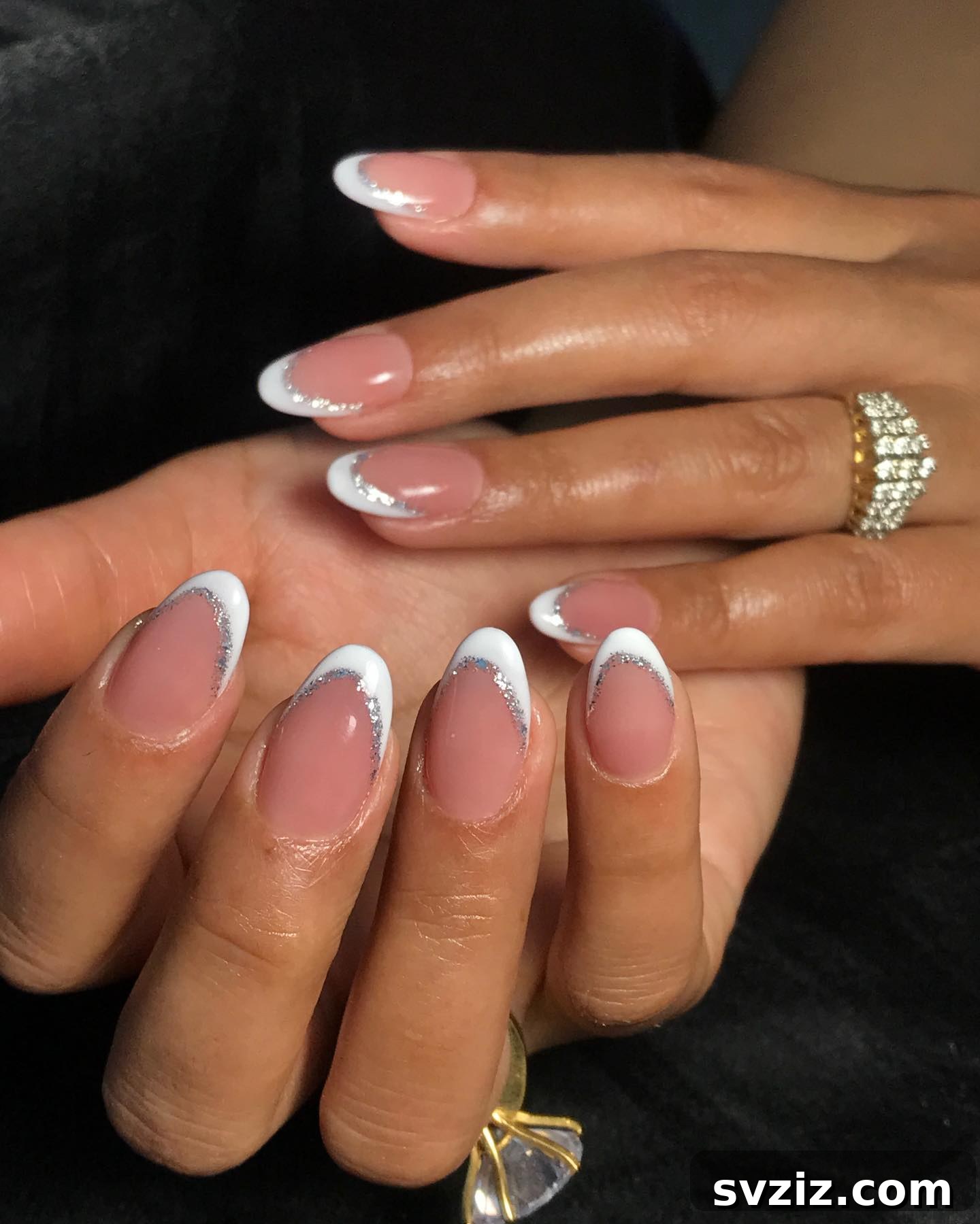 Stunning Bridal Nail Art Inspiration 26 Glamorous French nails with shimmering silver accents for a festive bridal look