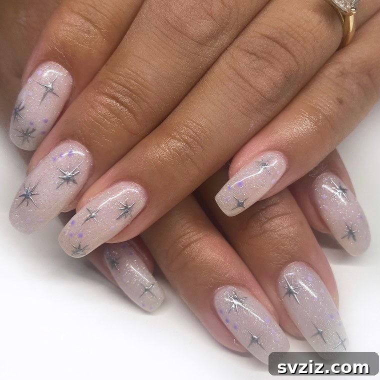 Stunning Bridal Nail Art Inspiration 29 Magical silver star nail design for a celestial wedding manicure