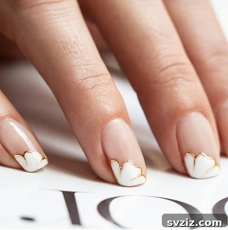 Stunning Bridal Nail Art Inspiration 42 Impeccable white and gold tips on bridal nails for a sophisticated look