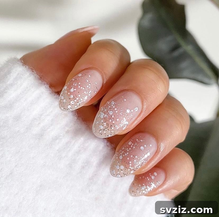 Stunning Bridal Nail Art Inspiration 9 Glimmering sparkly white wedding nails with a festive touch