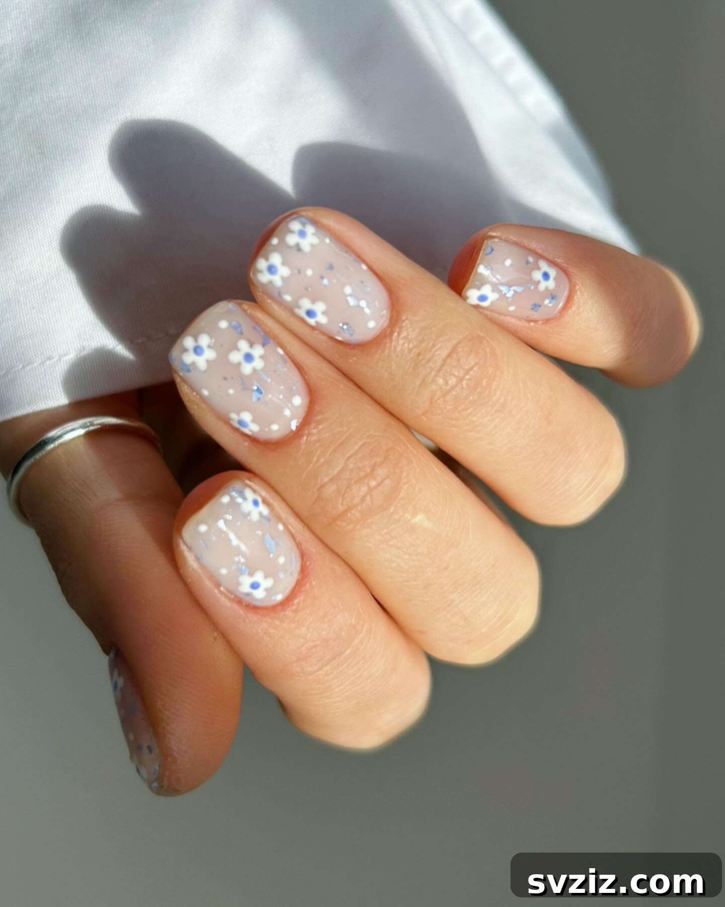 Stunning Bridal Nail Art Inspiration 10 Charming blue and white floral nail art for a spring wedding
