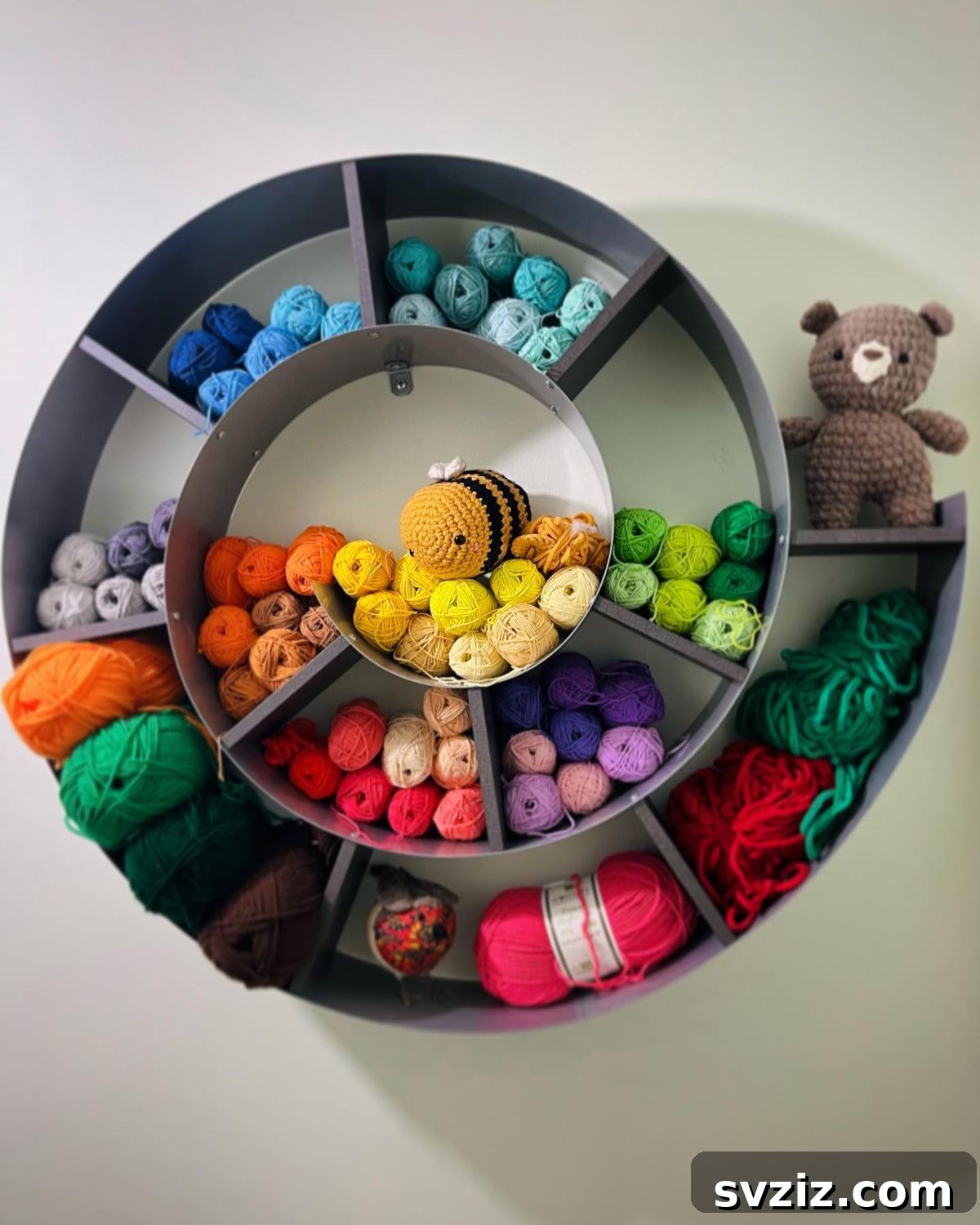 21 Ingenious Yarn Storage Solutions 12 A uniquely designed snail-shaped shelf displaying a whimsical yarn collection.