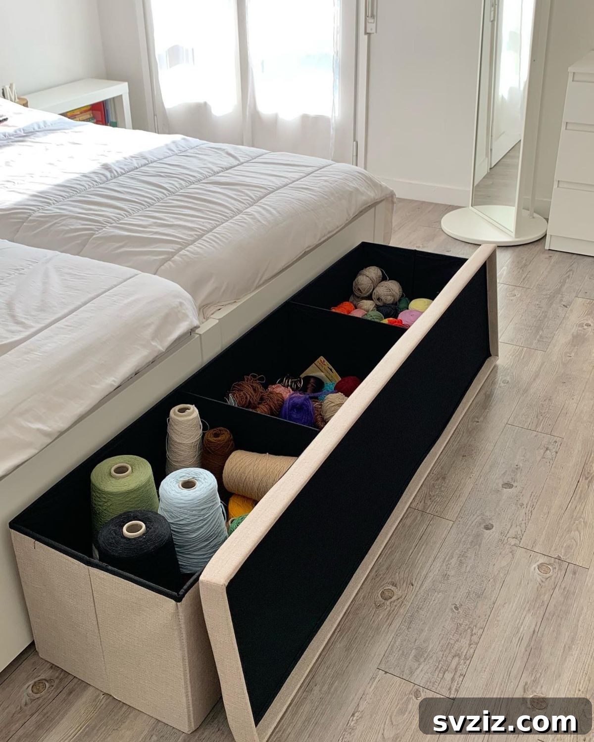 21 Ingenious Yarn Storage Solutions 17 A stylish storage ottoman used to neatly store and hide a collection of yarn.